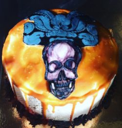 Hand painted skull salted caramel cake